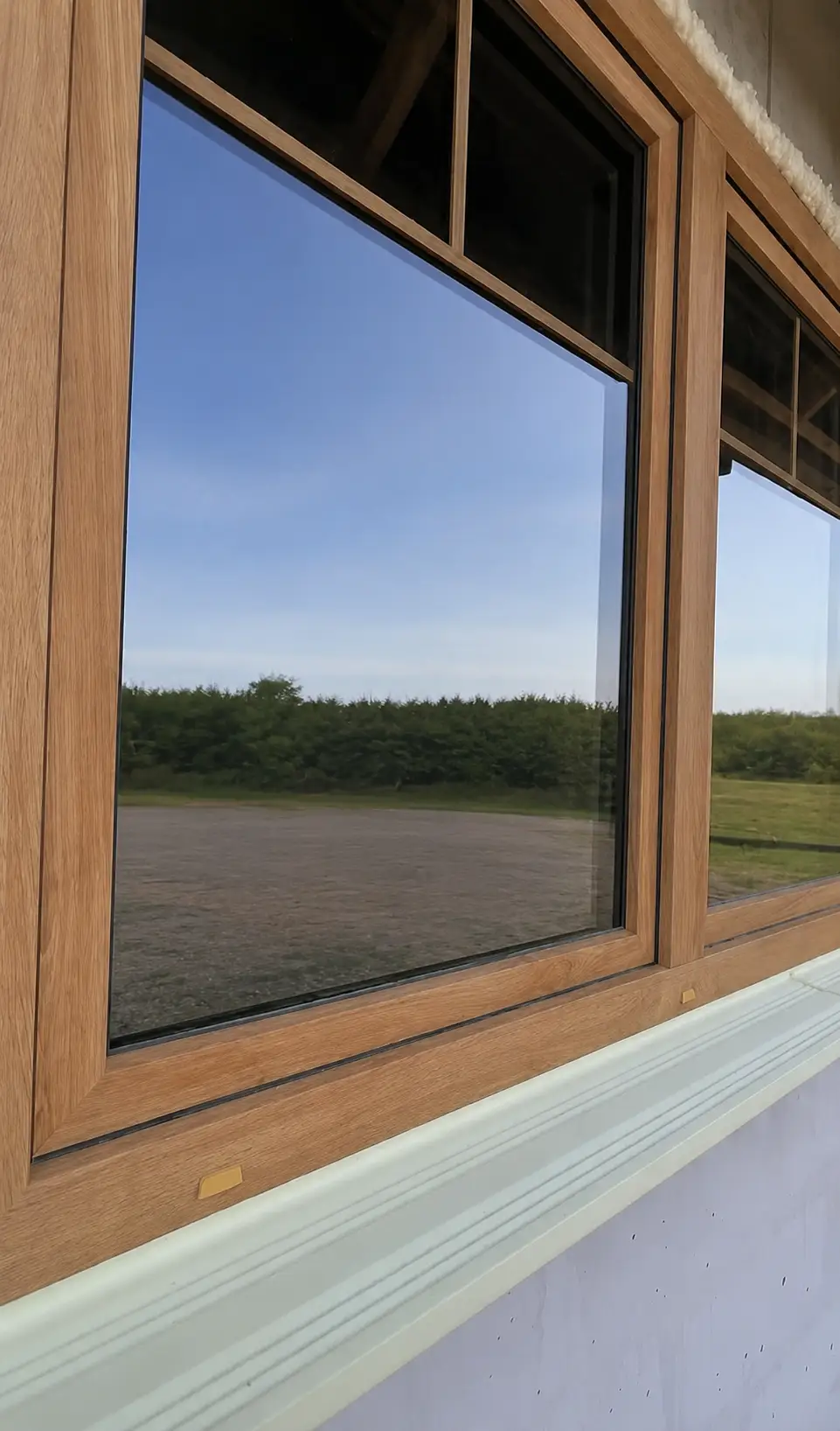 Okna Salamander Wood Oak — detal, realizacja Płock